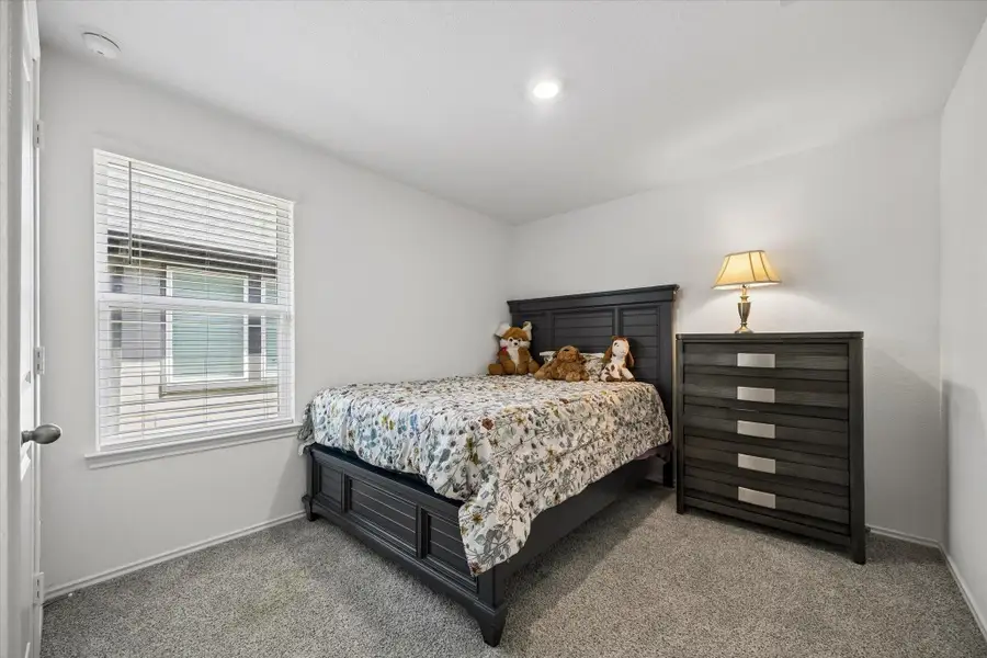 Furnished interior view inside a new home in Tamarron, Fulshear (Image 22).