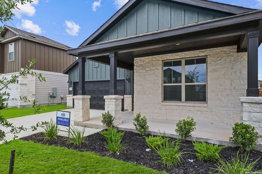 Exterior details and patio area of a home in Dove Song, Marion (Image 16).