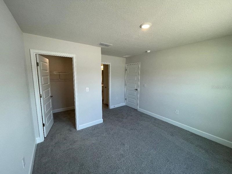 Spacious, unfurnished interior of a new home in Abbey Glen, Dade City (Image 23).
