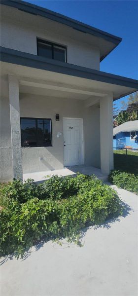 Exterior details and patio area of a home in , Miami (Image 1). Exterior details and patio area of a home in , Miami (Image 1).