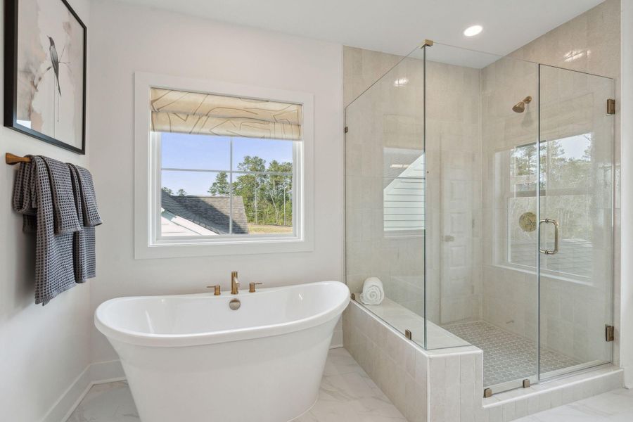 Furnished interior view inside a new home in Tidewater at Lakes of Cane Bay, Summerville (Image 56).