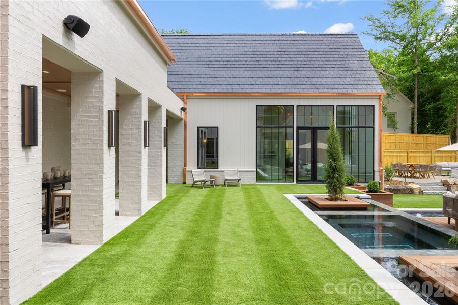 Exterior details and patio area of a home in , Charlotte (Image 24).