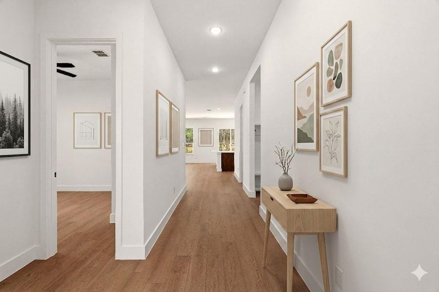 Hall with wood finished floors and recessed lighting