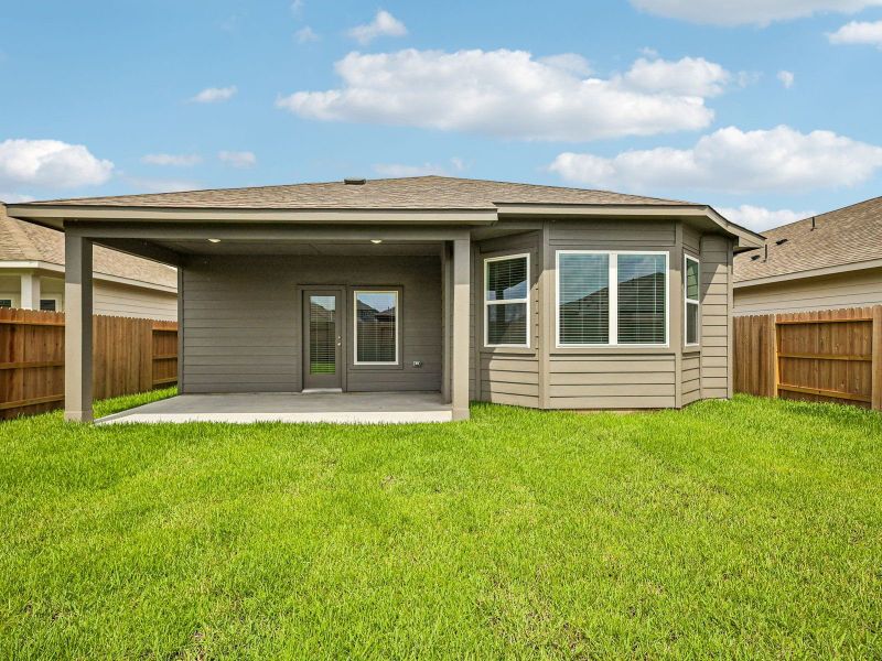Exterior details and patio area of a home in Riviera Pines - Premier Series, Huffman (Image 2). Exterior details and patio area of a home in Riviera Pines - Premier Series, Huffman (Image 2).
