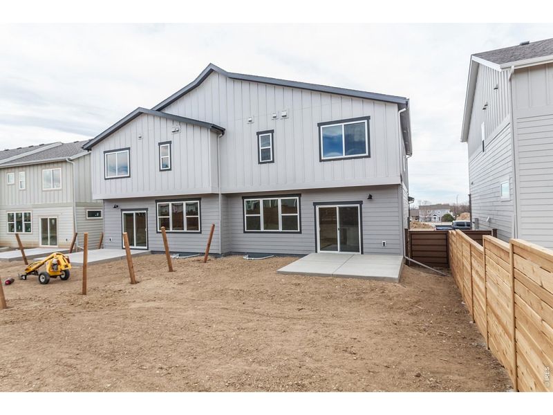 Exterior details and patio area of a home in Wilson Commons, Loveland (Image 26).