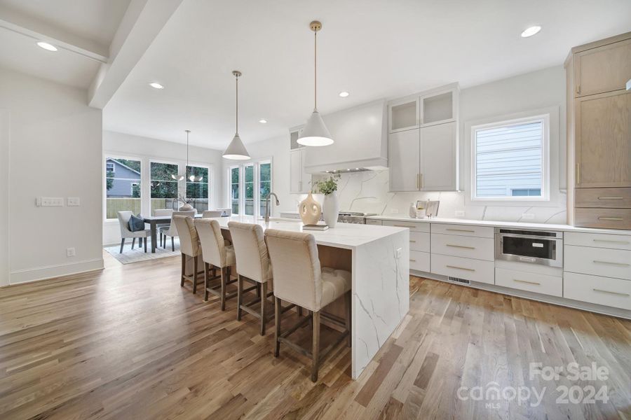 large chef's kitchen and dining area.