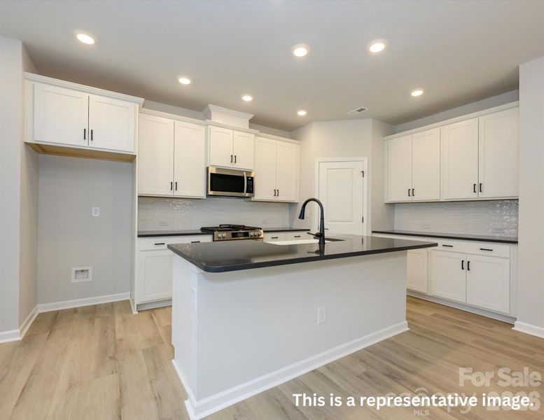 Furnished interior view inside a new home in North Creek Village, Huntersville (Image 5).
