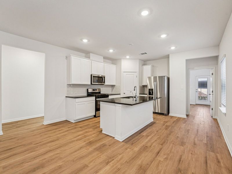 Furnished interior view inside a new home in Flora, Hutto (Image 3).