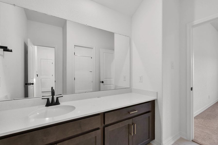 Secondary bathroom. Sample product photo. Actual exterior and interior selections may vary by homesite. Photo may be virtually staged. Secondary bathroom. Sample product photo. Actual exterior and interior selections may vary by homesite. Photo may be virtually staged.