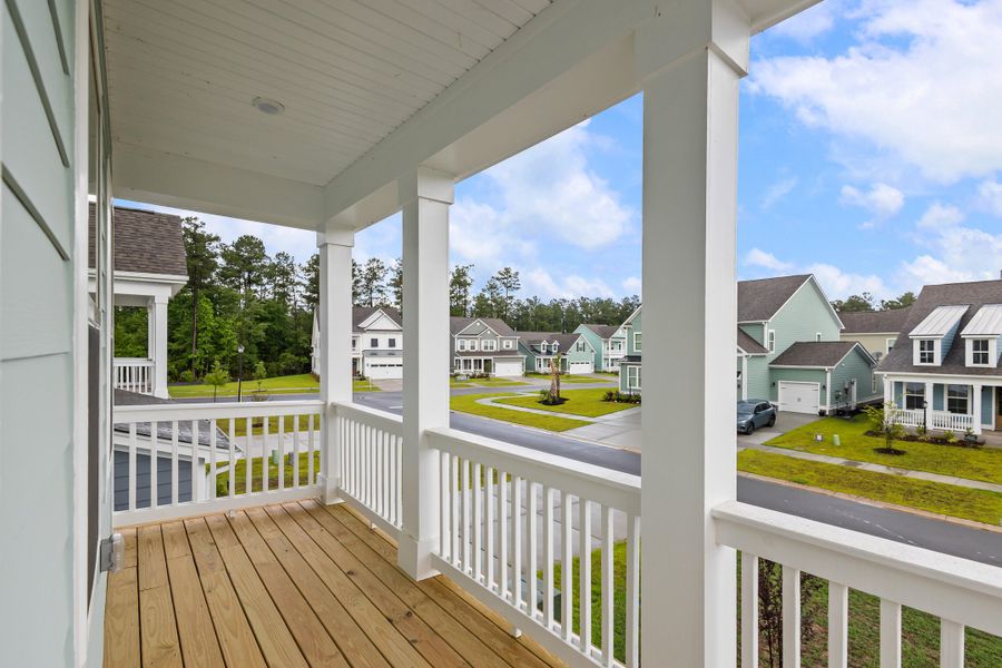 Exterior details and patio area of a home in Tidewater at Lakes of Cane Bay, Summerville (Image 4).