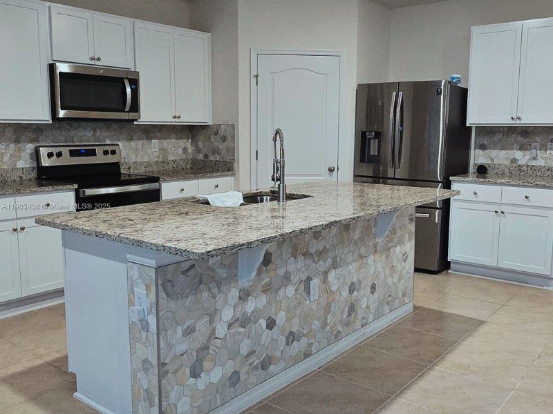 Furnished interior view inside a new home in , Davenport (Image 5).