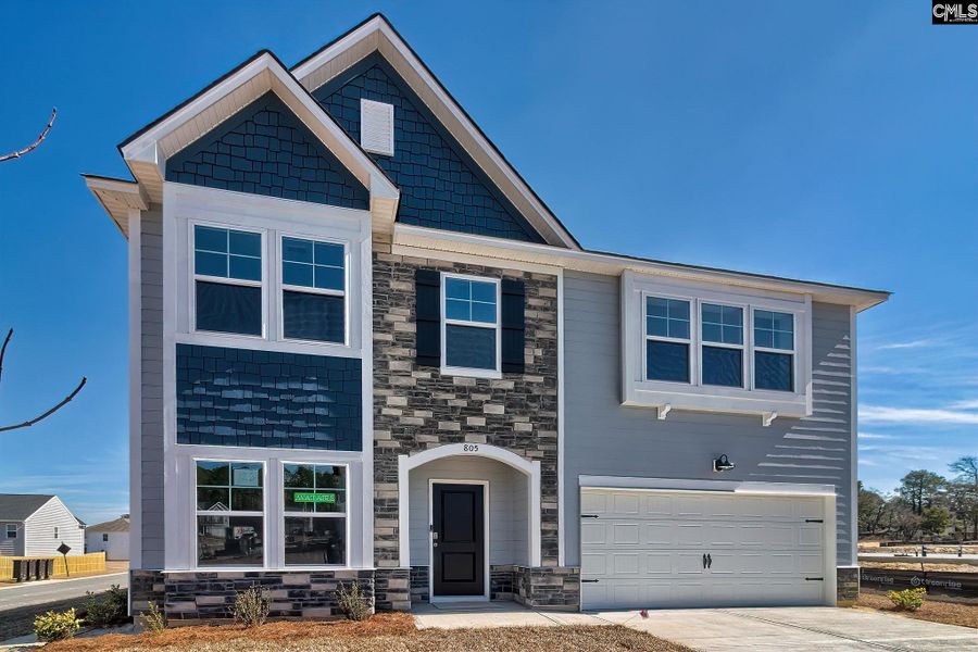 Front exterior of a new home in Cottages at Roofs Pond, West Columbia, SC, highlighting curb appeal (Image 2).