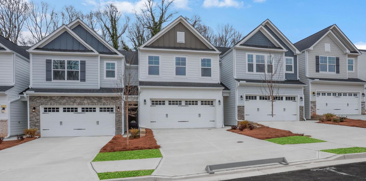 Front exterior of a new home in Villas at Dawsonville Townhomes, Dawsonville, GA, highlighting curb appeal (Image 24).