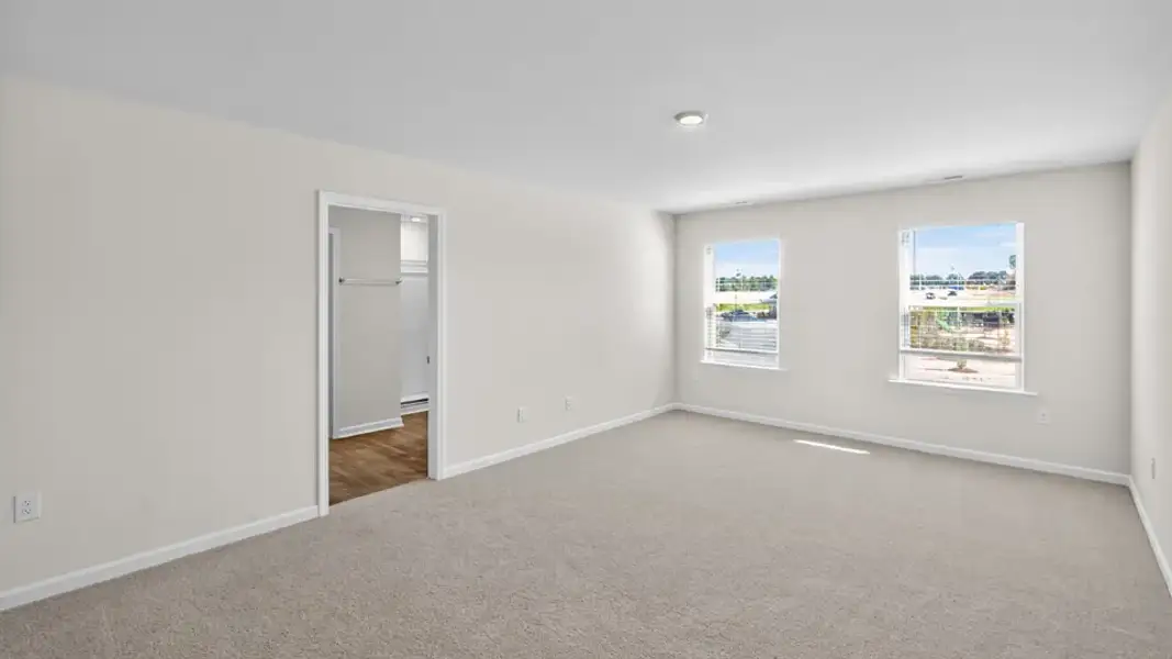 Spacious, unfurnished interior of a new home in Mangum Farms, Stem (Image 30).