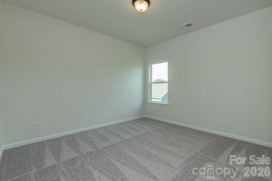 Spacious, unfurnished interior of a new home in Country Club Village, Salisbury (Image 32).