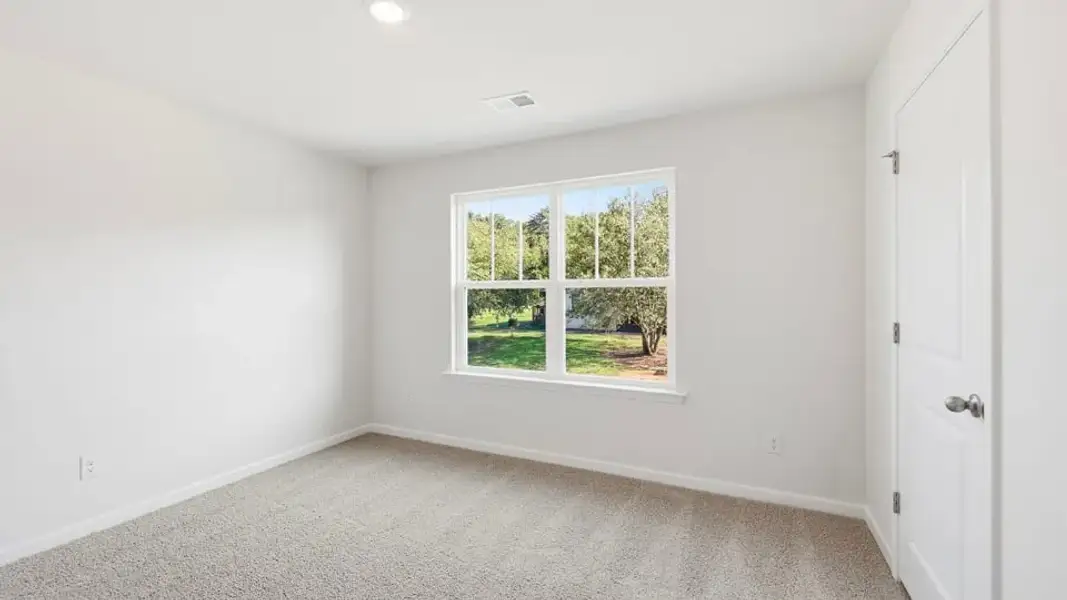Spacious, unfurnished interior of a new home in Ben Hurt Road, Lyman (Image 28).