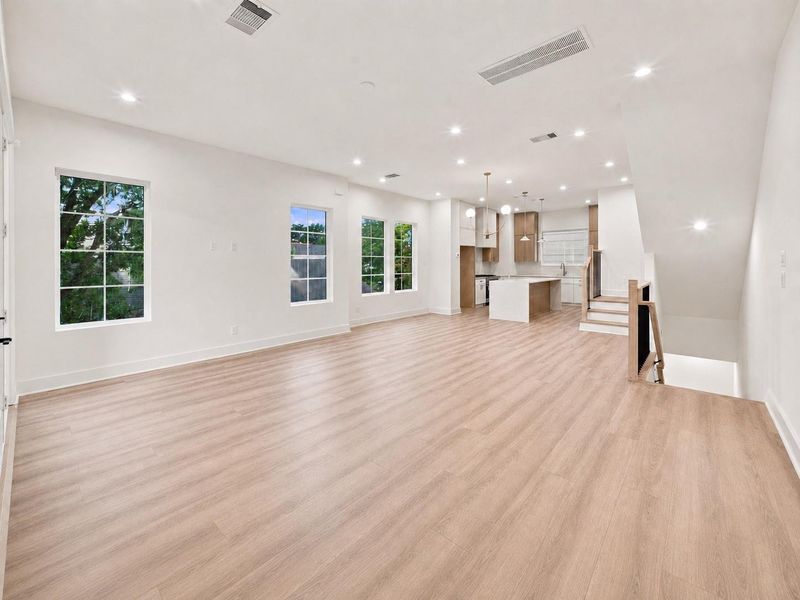 Spacious living, dining and kitchen areas on the second floor offers abundant natural light.