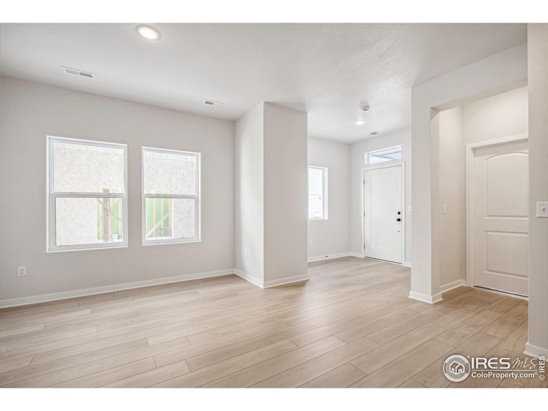 Spacious, unfurnished interior of a new home in Kinston Mainstreet Townhomes, Loveland (Image 27).
