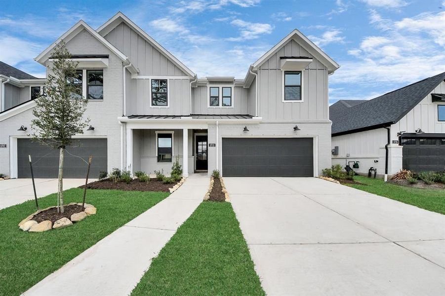 Front exterior of a new home in Sienna: Signature Series, Missouri City, TX, highlighting curb appeal (Image 25). Front exterior of a new home in Sienna: Signature Series, Missouri City, TX, highlighting curb appeal (Image 25).