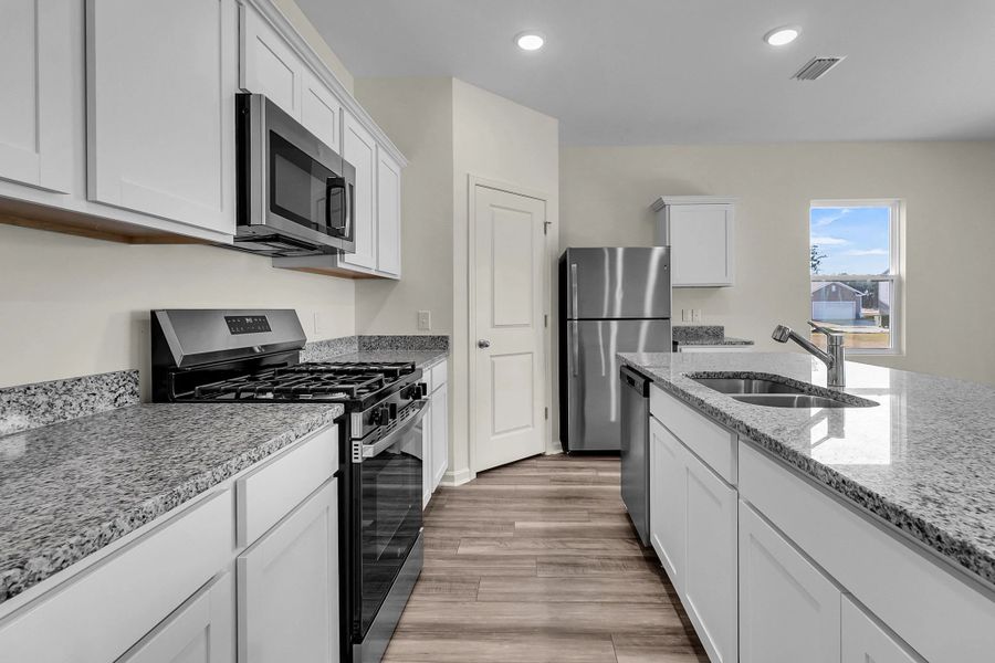 Representative furnished interior of a home built from the Supernova by Starlight Homes in Liberte, Converse (Image 11).