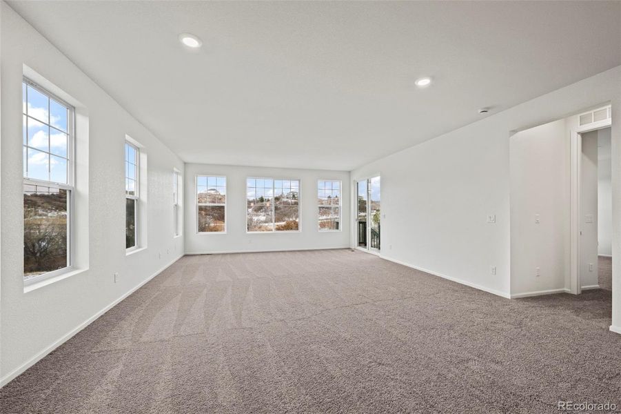 Spacious, unfurnished interior of a new home in Terrain Oak Valley, Castle Rock (Image 8).
