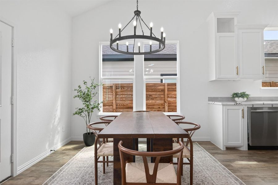 Bright dining area conveniently located next to the kitchen and living room.