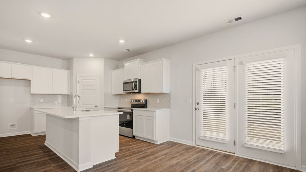 Representative furnished interior of a home built from the Somerset by D.R. Horton in Oakchase at Hampton, Hampton (Image 6).