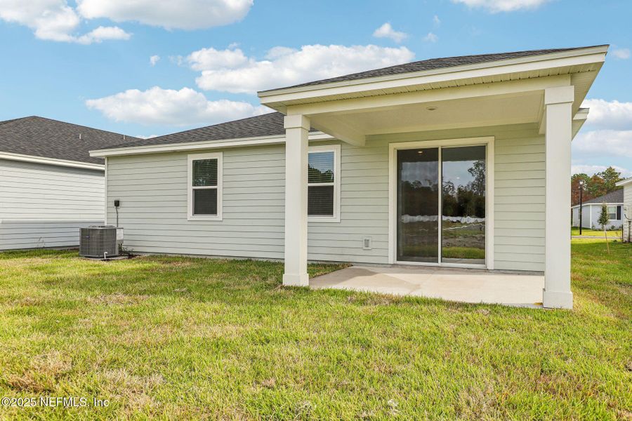 Exterior details and patio area of a home in Cypress Meadows - Signature Series, Jacksonville (Image 20).