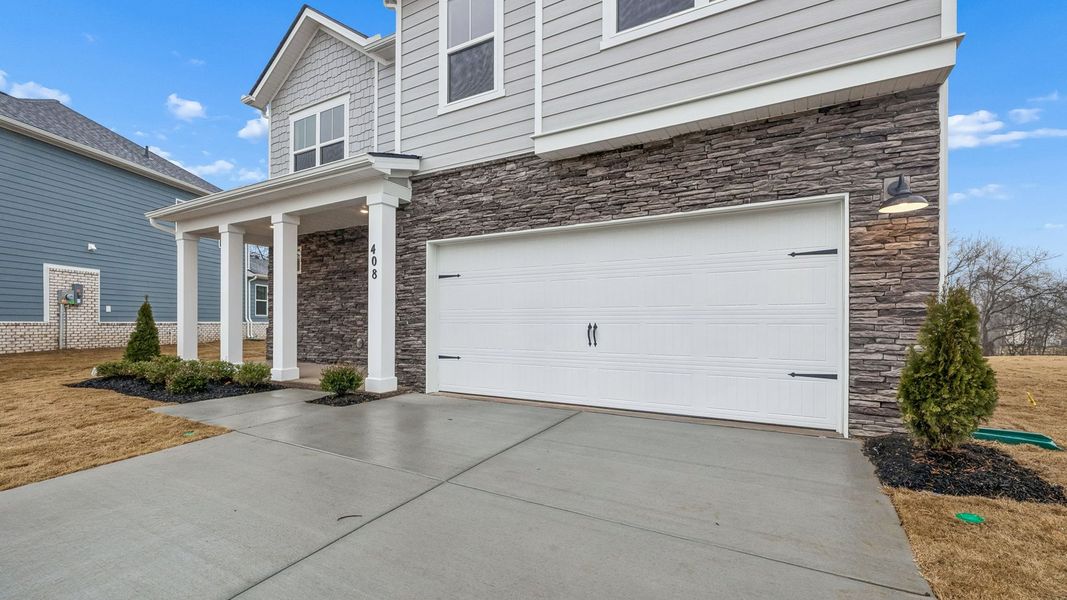Exterior details and patio area of a home in Harvest Point, Spring Hill (Image 3).