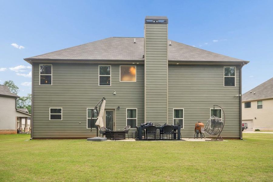 Exterior details and patio area of a home in Nine Oaks, Locust Grove (Image 4). Exterior details and patio area of a home in Nine Oaks, Locust Grove (Image 4).