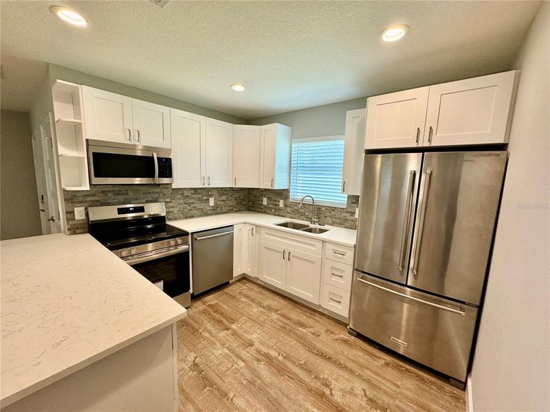 Furnished interior view inside a new home in , Clearwater (Image 9). Furnished interior view inside a new home in , Clearwater (Image 9).