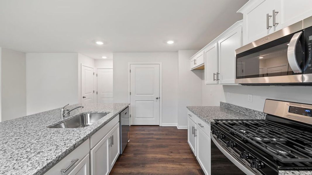 Furnished interior view inside a new home in Harrier Point, Woodruff (Image 7).