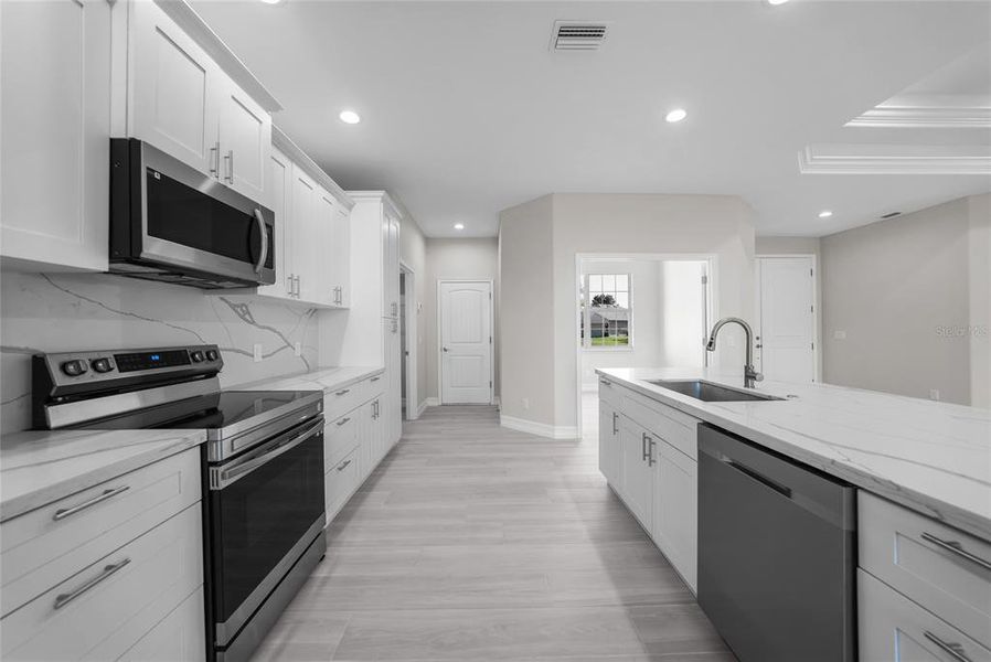 Furnished interior view inside a new home in , Punta Gorda (Image 6).