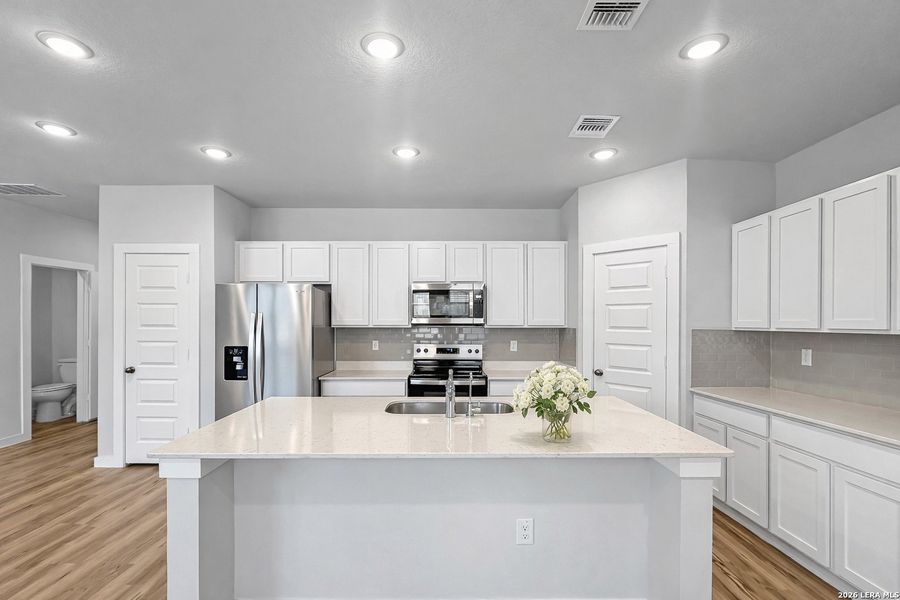 Furnished interior view inside a new home in Bear Creek, San Antonio (Image 15).