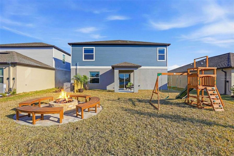 Exterior details and patio area of a home in Prosperity Lakes, Parrish (Image 3).
