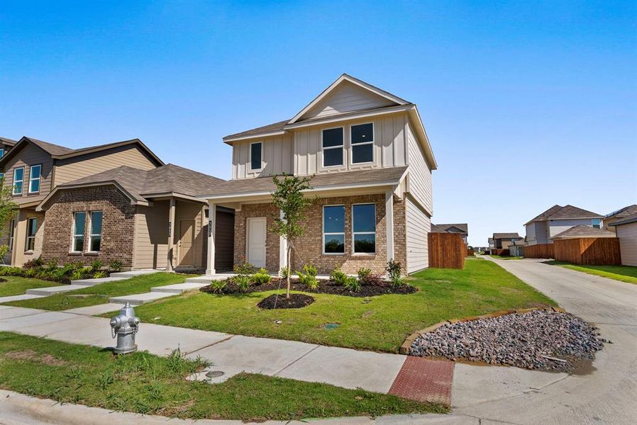 Front exterior of a new home in Orchard Village, Fort Worth, TX, highlighting curb appeal (Image 2).