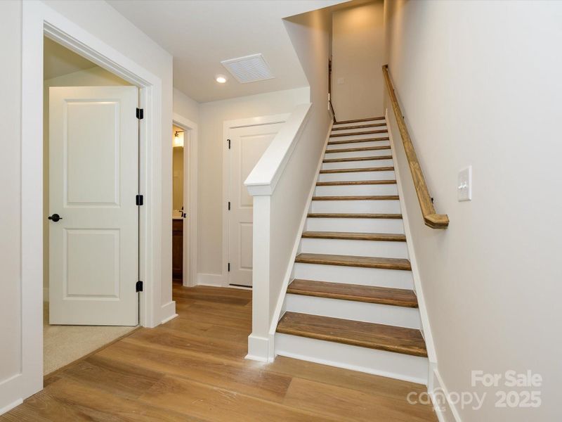 Wood-Look Durable Flooring and Stairs With First Floor Guest Suite
