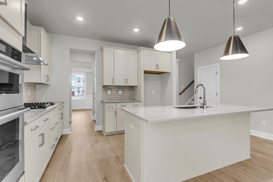 Furnished interior view inside a new home in Tidewater at Lakes of Cane Bay, Summerville (Image 13).