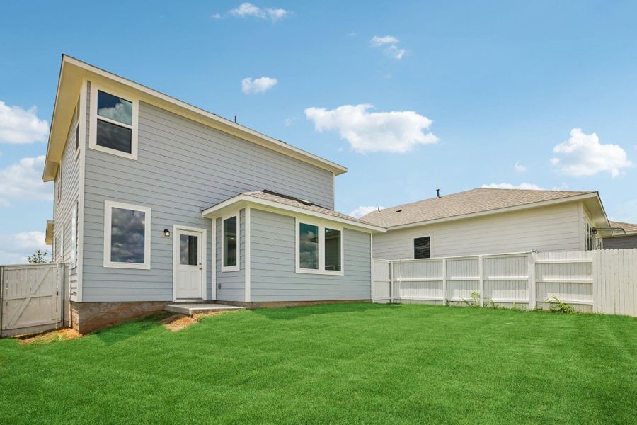 Exterior details and patio area of a home in Harvest Ridge, Elgin (Image 4).