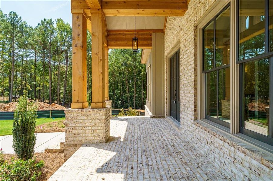 Exterior details and patio area of a home in Malone's Pond, Ball Ground (Image 35).