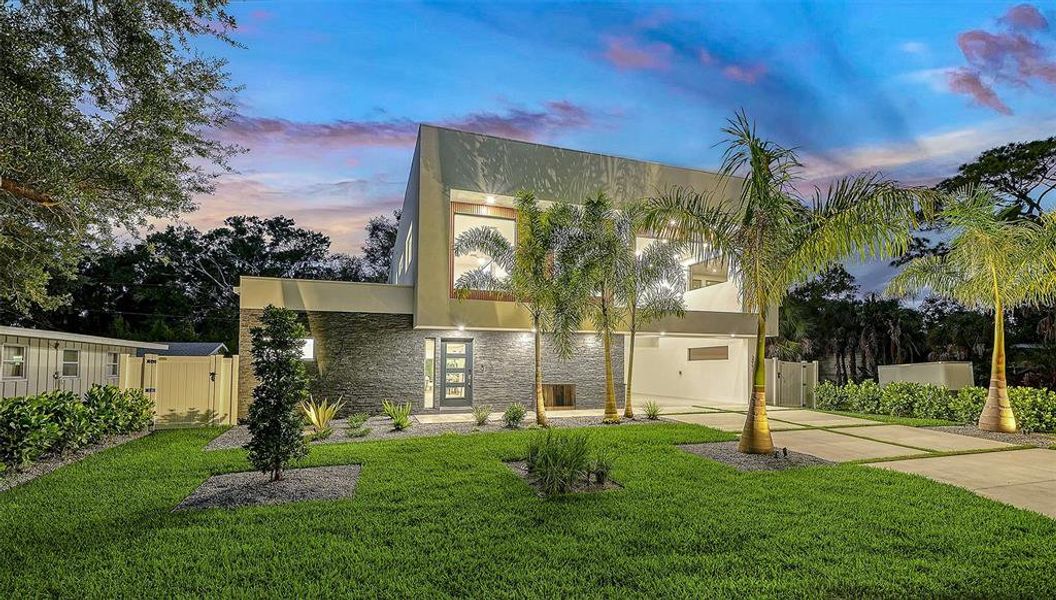 Front exterior of a new home in , Sarasota, FL, highlighting curb appeal (Image 21).