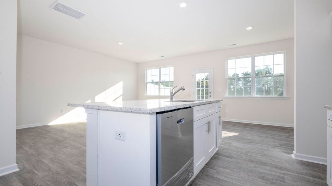 Furnished interior view inside a new home in North Village Townes, Greensboro (Image 6).