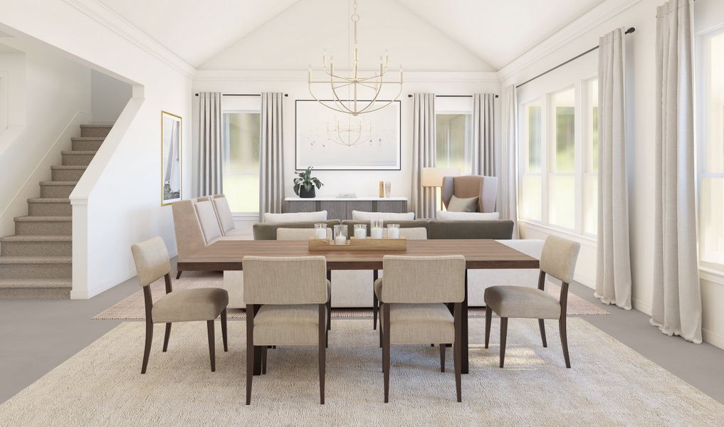 Vaulted ceiling dining area with pendant lighting