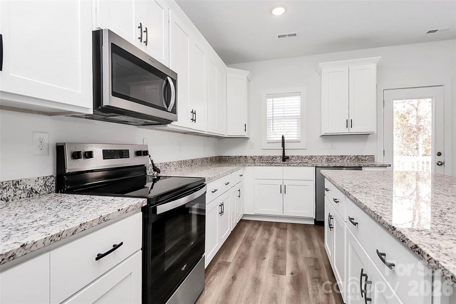 Furnished interior view inside a new home in , Monroe (Image 10).