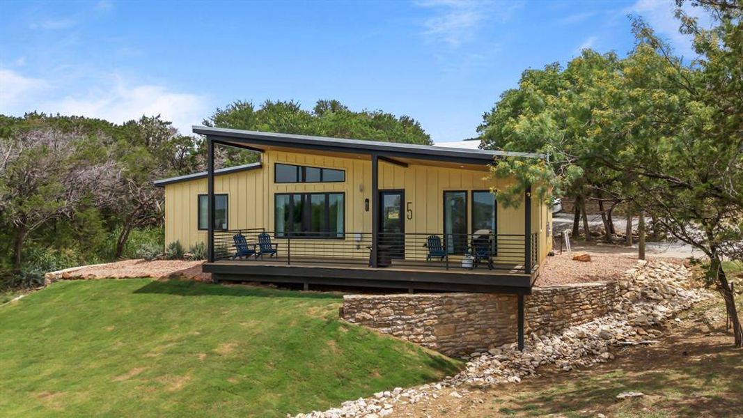 Front exterior of a new home in , Graford, TX, highlighting curb appeal (Image 17). Front exterior of a new home in , Graford, TX, highlighting curb appeal (Image 17).