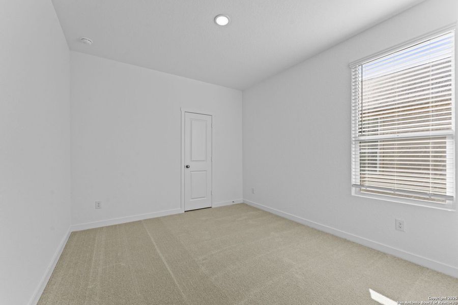 Spacious, unfurnished interior of a new home in Waterwheel: Coastline Collection, San Antonio (Image 21).