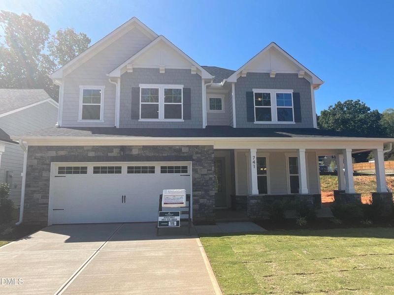 Front exterior of a new home in Sage on North Main, Wake Forest, NC, highlighting curb appeal (Image 20).