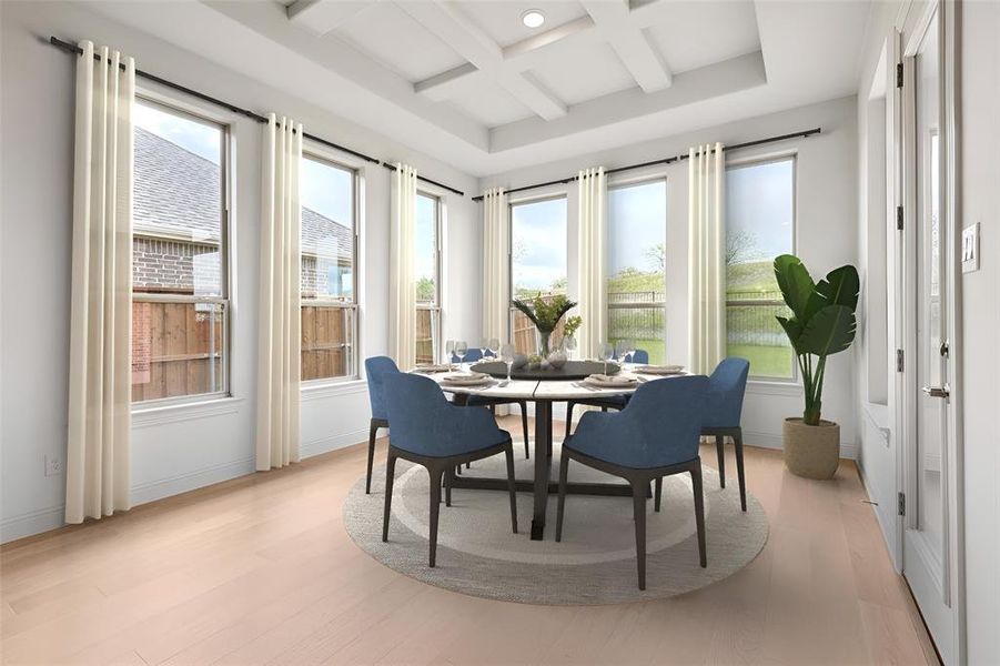 Sunroom featuring coffered ceiling and beam ceiling