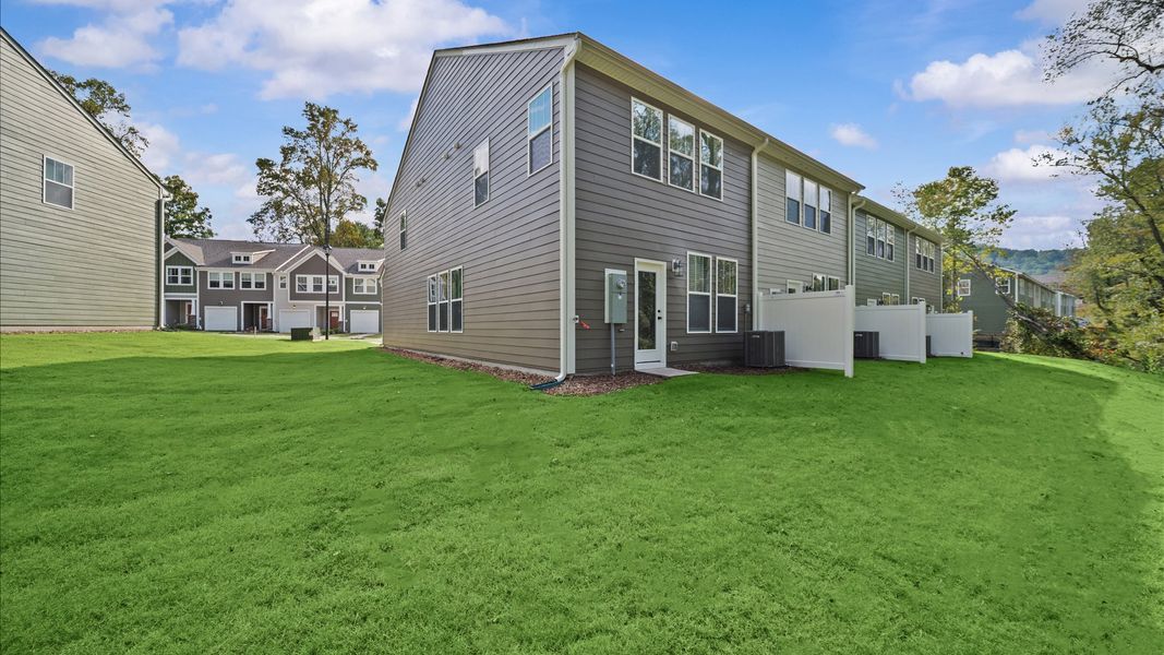 Exterior details and patio area of a home in Clayton Crossing, Arden (Image 1). Exterior details and patio area of a home in Clayton Crossing, Arden (Image 1).
