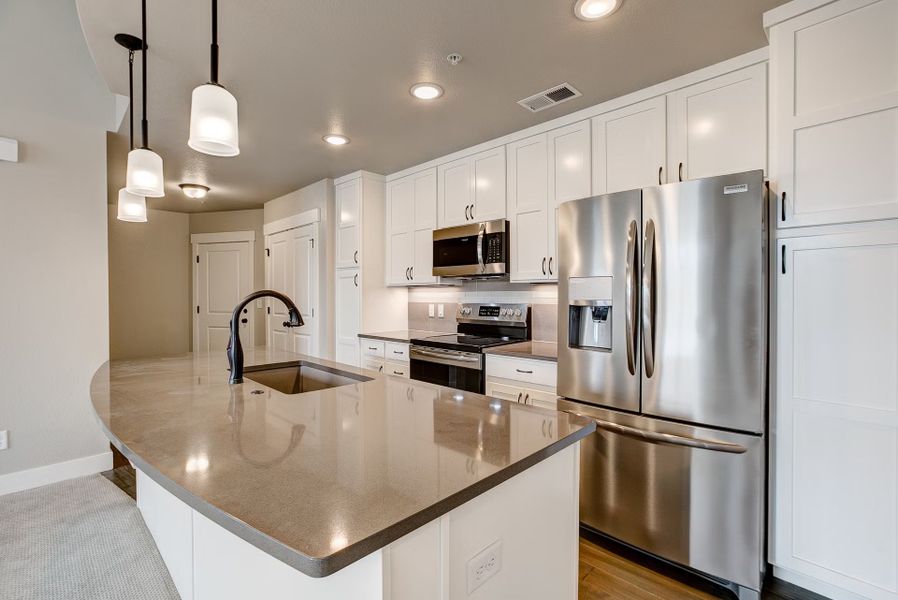 Furnished interior view inside a new home in The Lakes at Centerra - North Shore Flats, Loveland (Image 6).